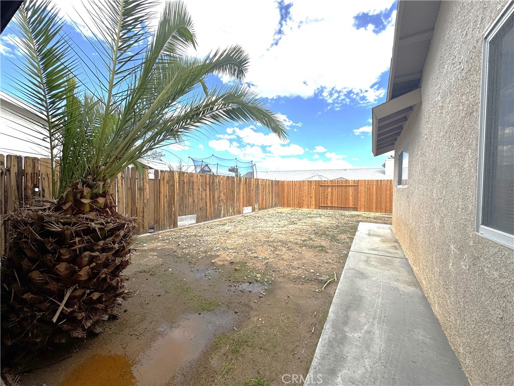 400 Vista Street Ridgecrest, CA 93555 - Photo 7 of 32 a view of a backyard with pathway
