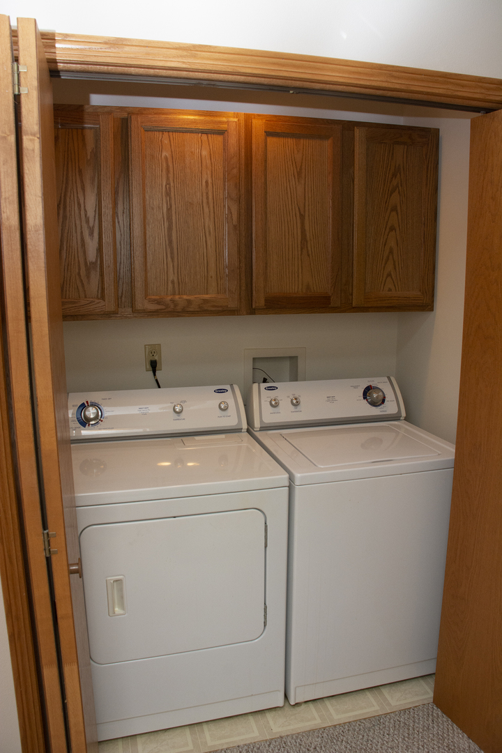 15479 Henry Road, Unit B Morrison, IL 61270 - Photo 12 of 18 a utility room with dryer and washer