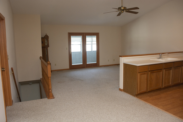 15479 Henry Road, Unit B Morrison, IL 61270 - Photo 7 of 18 a view of a room with gym equipment