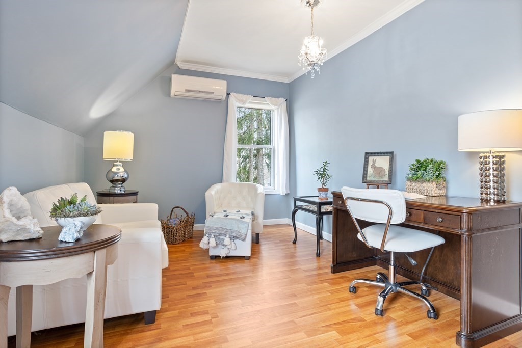 114 River Street Hudson, MA 01749 - Photo 24 of 40 a living room with furniture a window and a potted plant