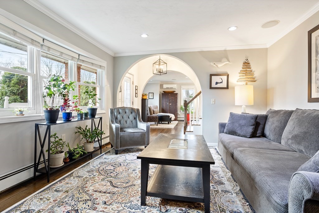 114 River Street Hudson, MA 01749 - Photo 3 of 40 a living room with furniture and a large window