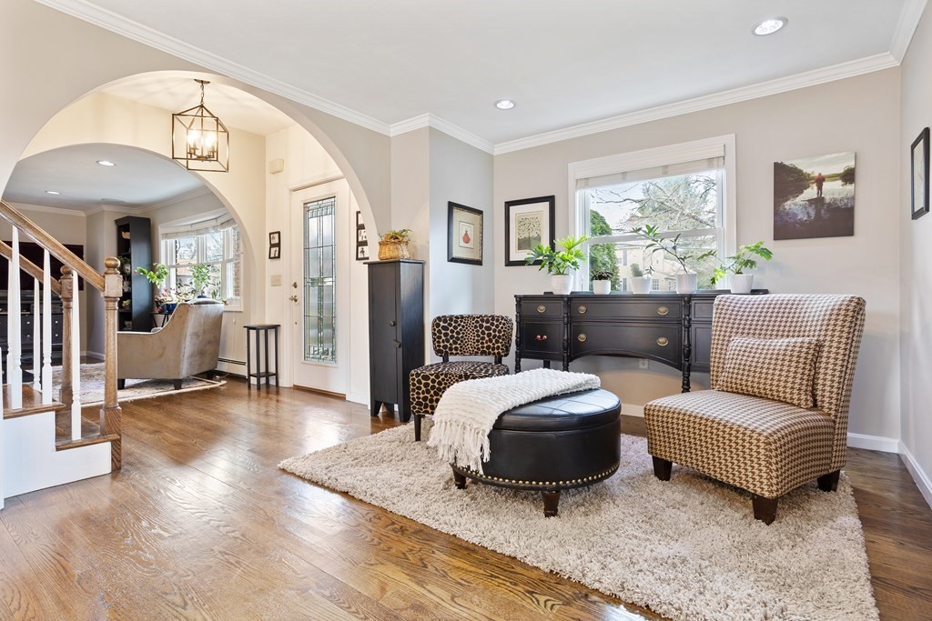 114 River Street Hudson, MA 01749 - Photo 5 of 40 a living room with furniture and a large window