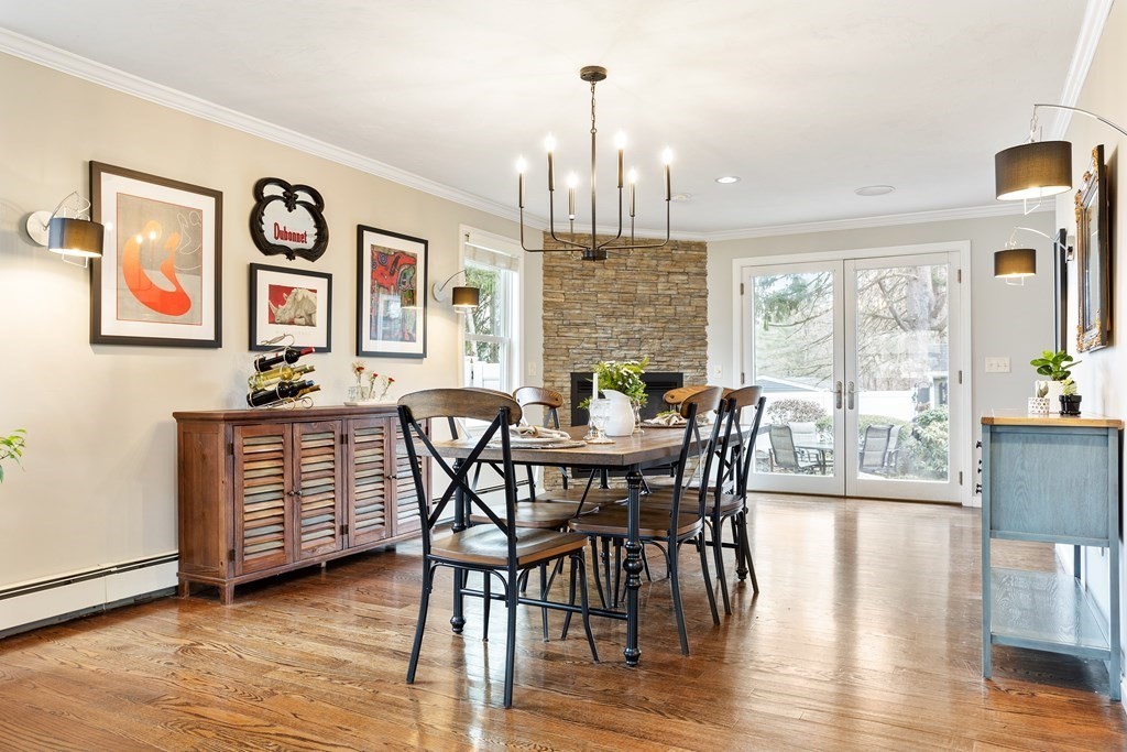 114 River Street Hudson, MA 01749 - Photo 6 of 40 a view of a dining room with furniture window and wooden floor