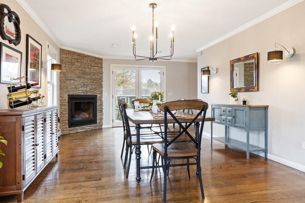 114 River Street Hudson, MA 01749 - Photo 7 of 40 a view of a dining room with furniture window and wooden floor