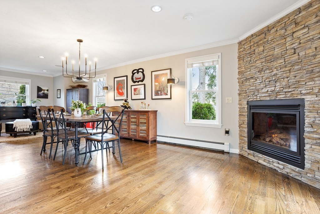 114 River Street Hudson, MA 01749 - Photo 8 of 40 a view of a livingroom with furniture window and wooden floor