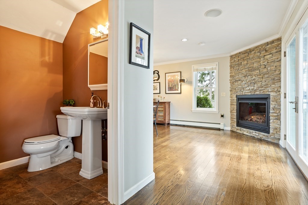 114 River Street Hudson, MA 01749 - Photo 9 of 40 a bathroom with a toilet and a sink