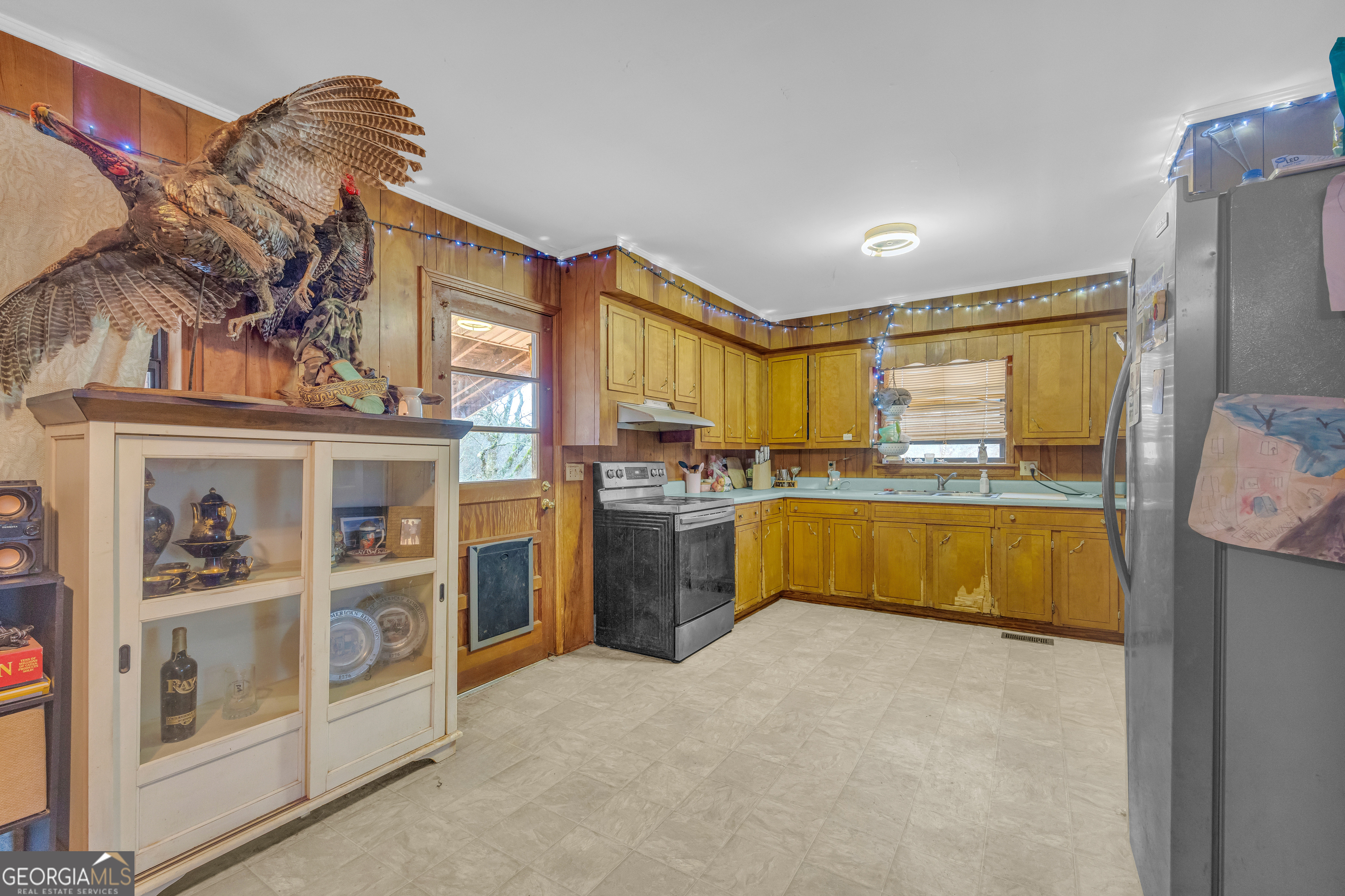 787 Parham Town Road Bowman, GA 30624 - Photo 27 of 49 a bathroom with a tub sink and mirror