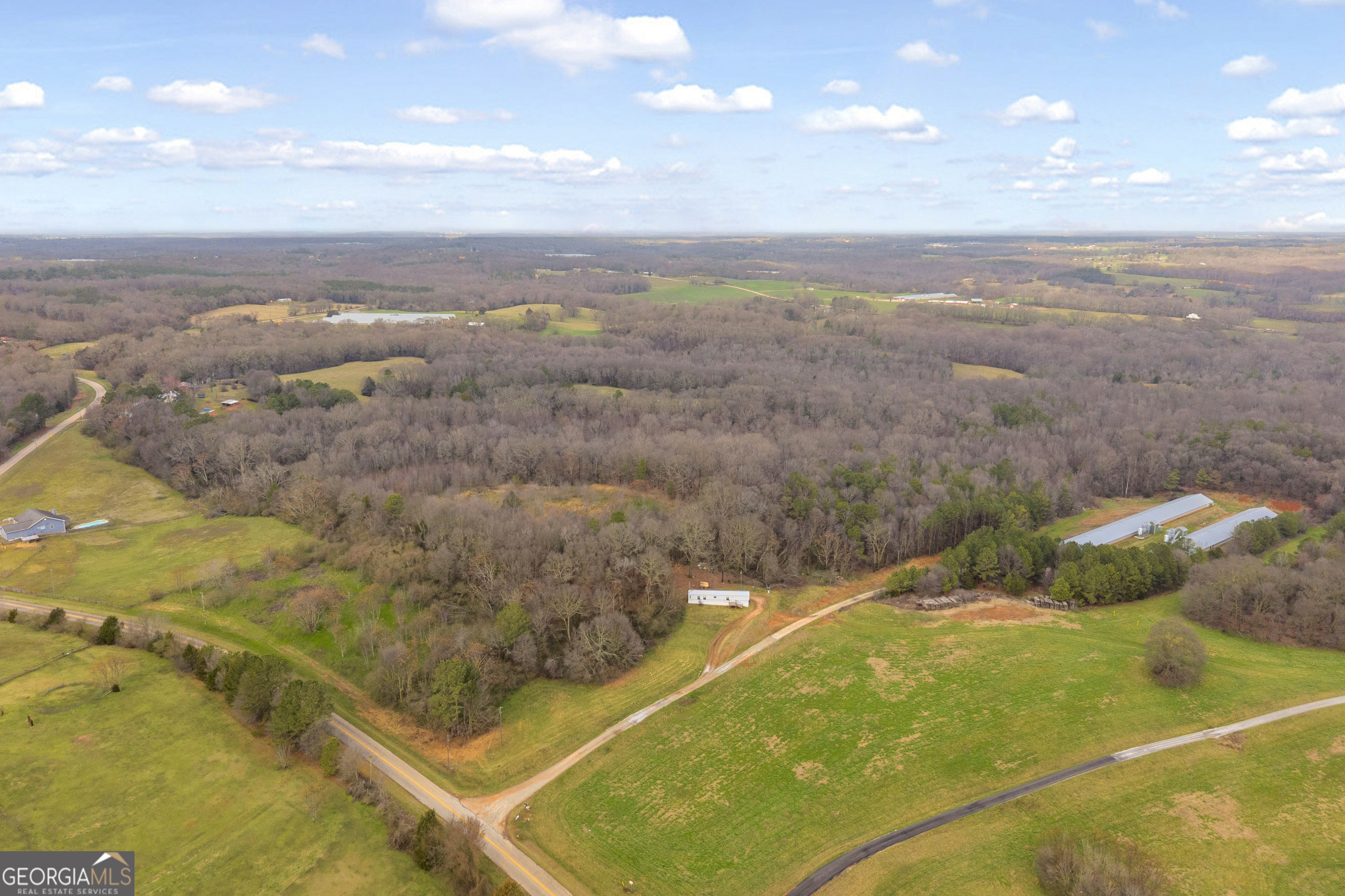 787 Parham Town Road Bowman, GA 30624 - Photo 3 of 49 a view of a indoor basketball court