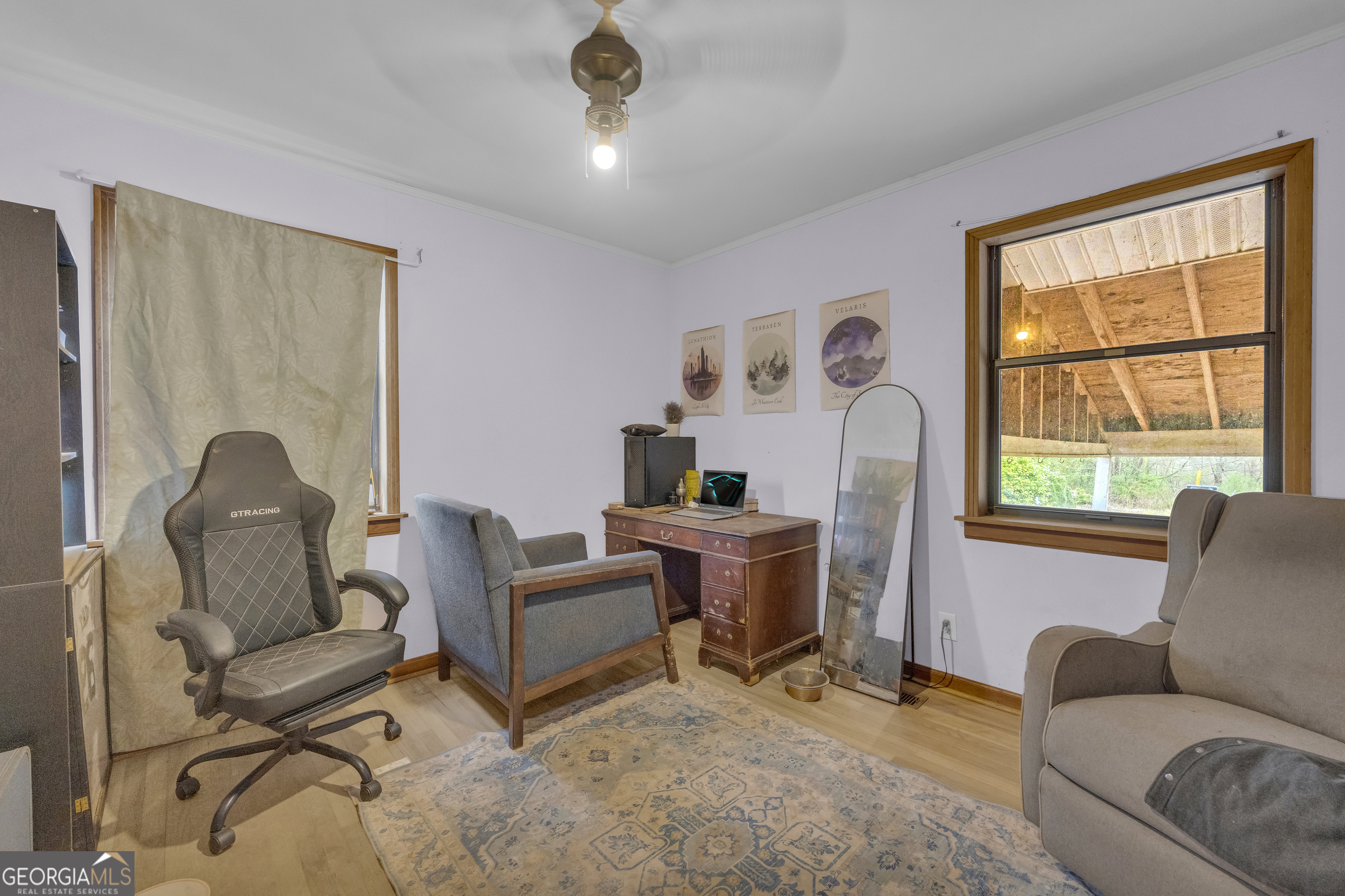 787 Parham Town Road Bowman, GA 30624 - Photo 32 of 49 a living room with furniture and a window