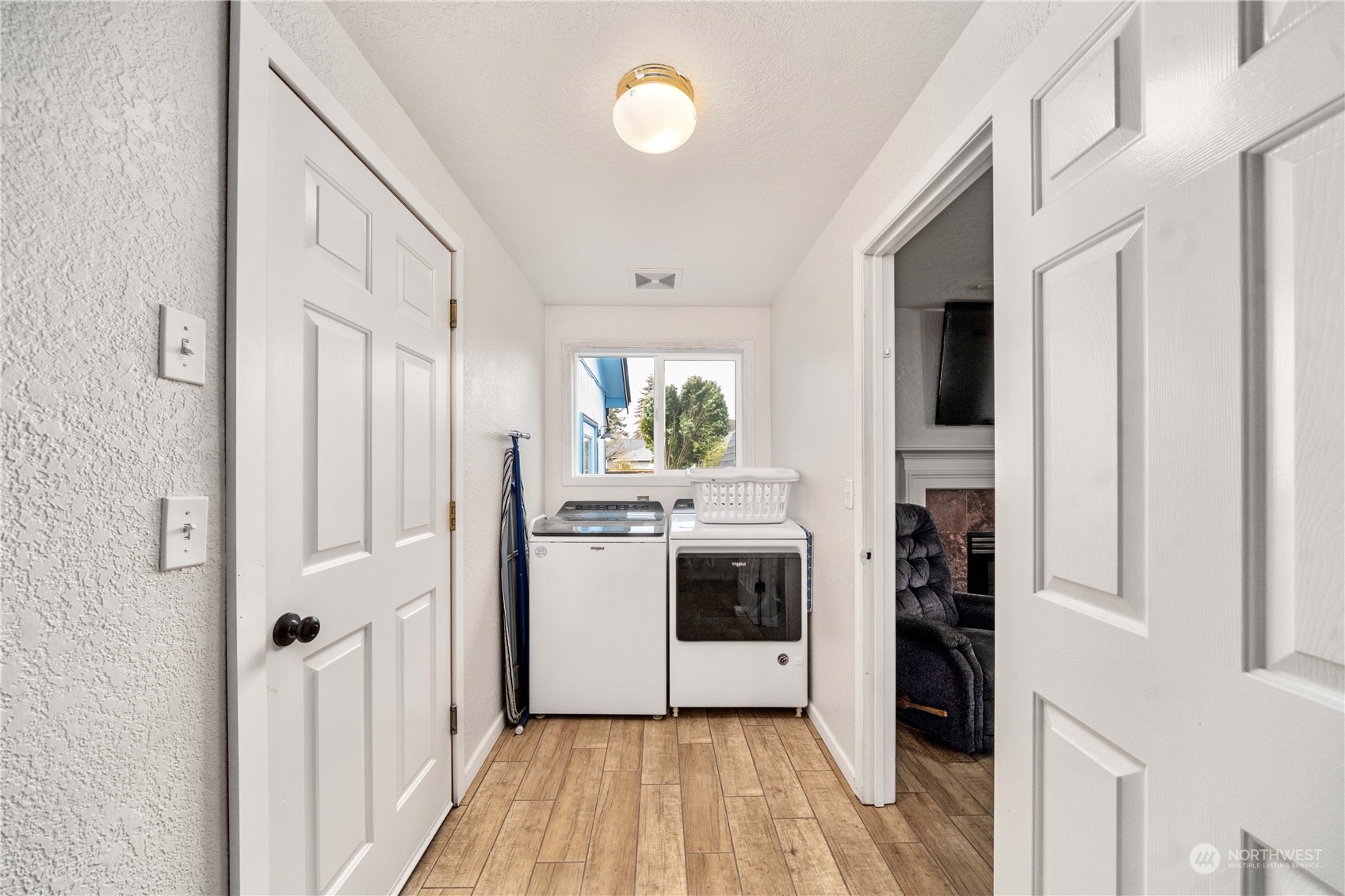 5911 Compton Loop Southeast Lacey, WA 98513 - Photo 14 of 32 a kitchen with a refrigerator a stove top oven and white walls