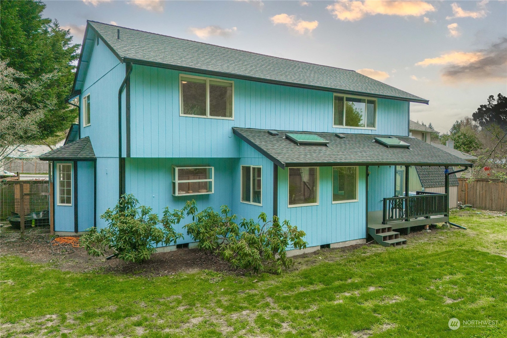 5911 Compton Loop Southeast Lacey, WA 98513 - Photo 26 of 32 a front view of a house with a yard