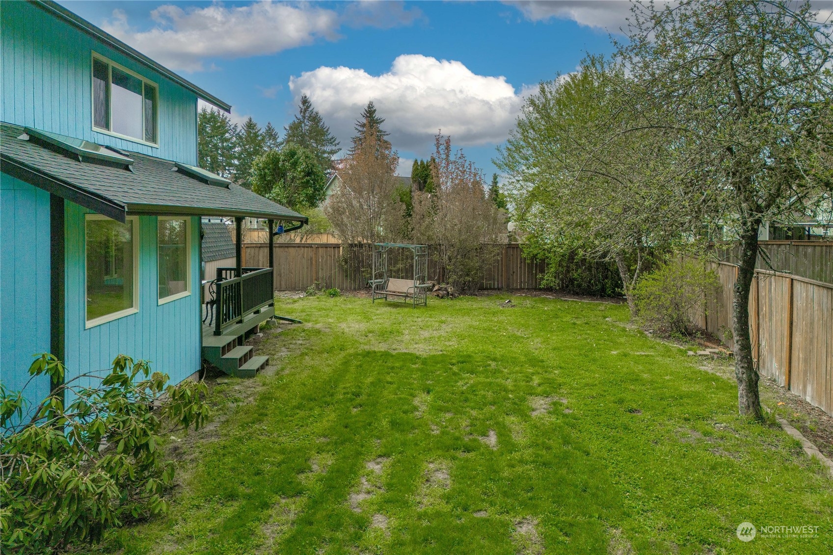 5911 Compton Loop Southeast Lacey, WA 98513 - Photo 27 of 32 a view of a back yard