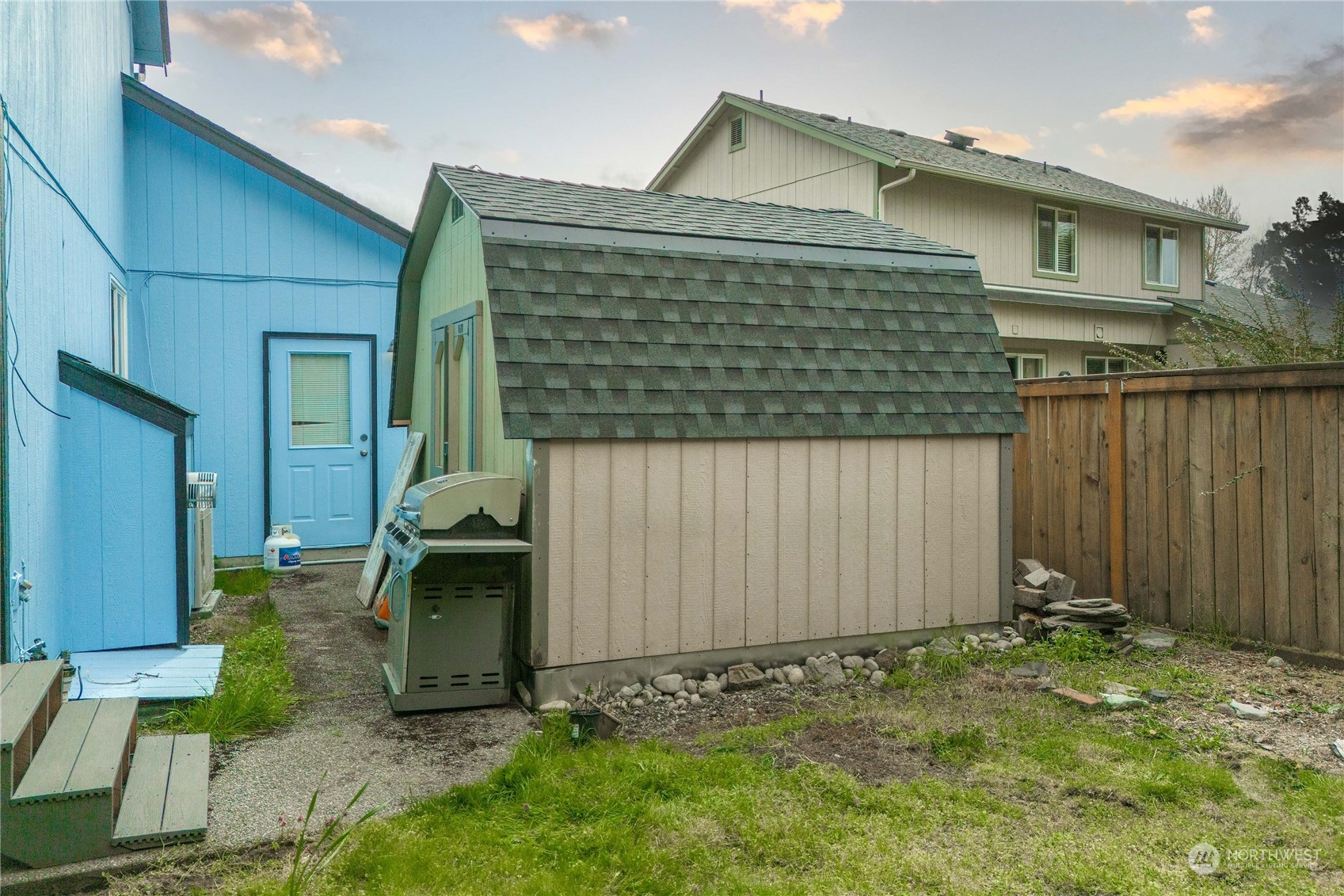 5911 Compton Loop Southeast Lacey, WA 98513 - Photo 30 of 32 a front view of a house with garden