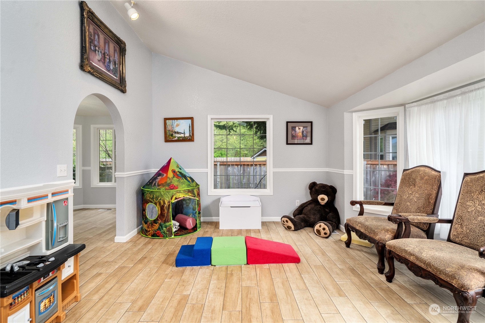 5911 Compton Loop Southeast Lacey, WA 98513 - Photo 4 of 32 a living room with furniture and a wooden floor