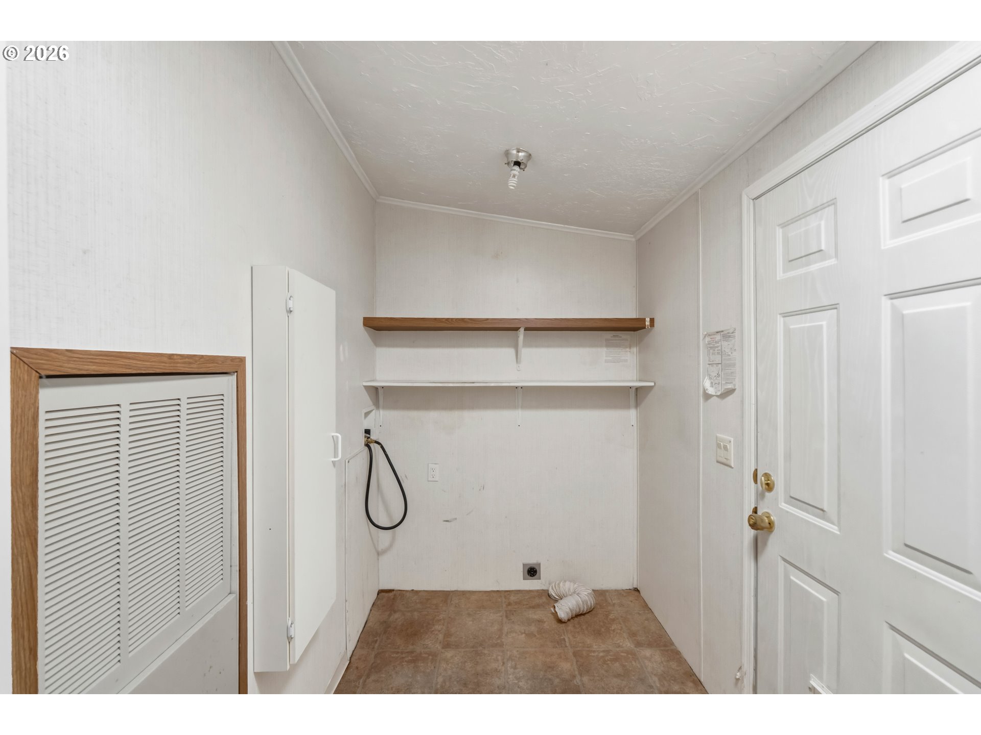 1030 June Avenue Southeast Bandon, OR 97411 - Photo 18 of 43 a view of an empty room