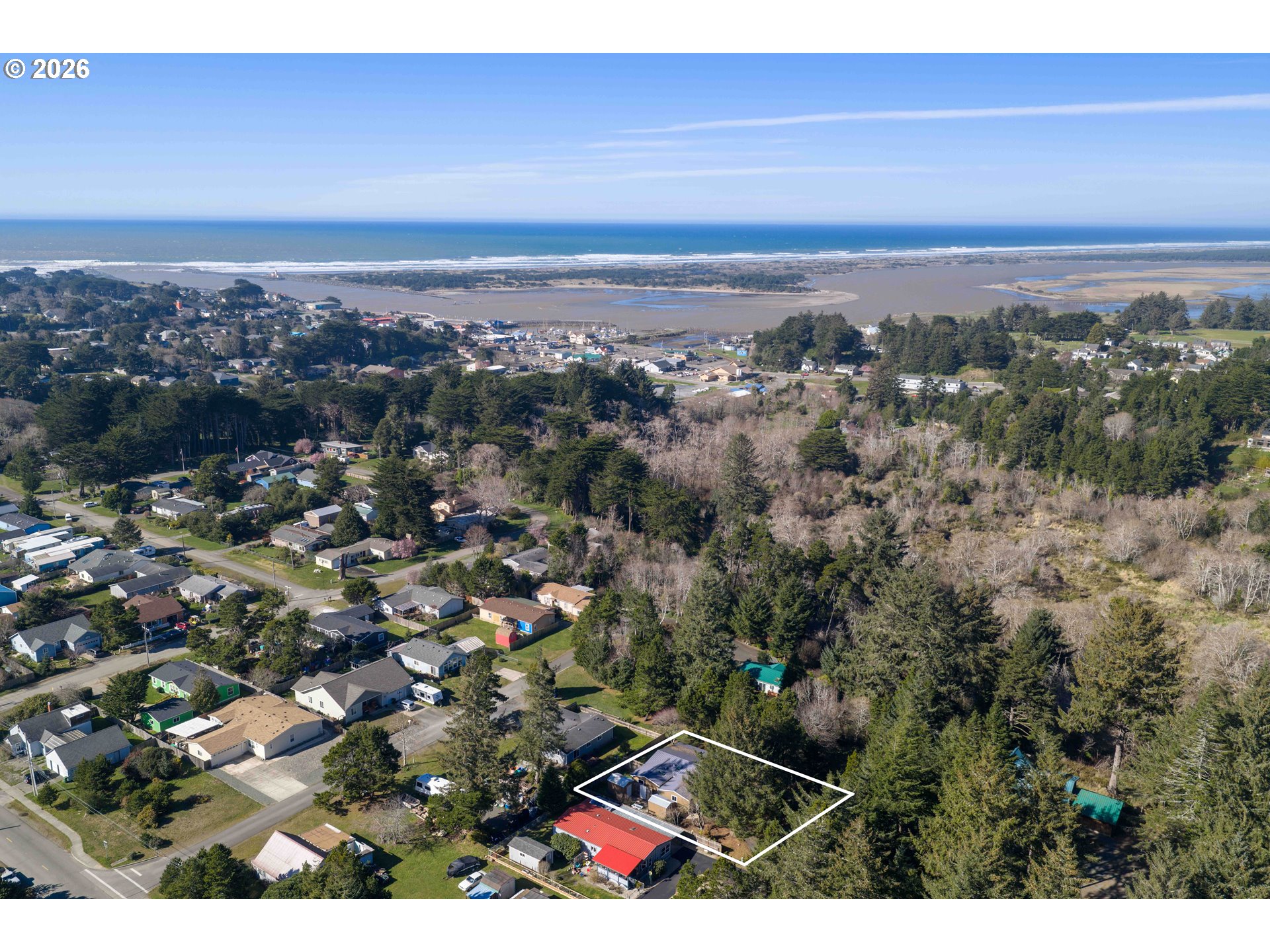 1030 June Avenue Southeast Bandon, OR 97411 - Photo 3 of 43 an aerial view of multiple house