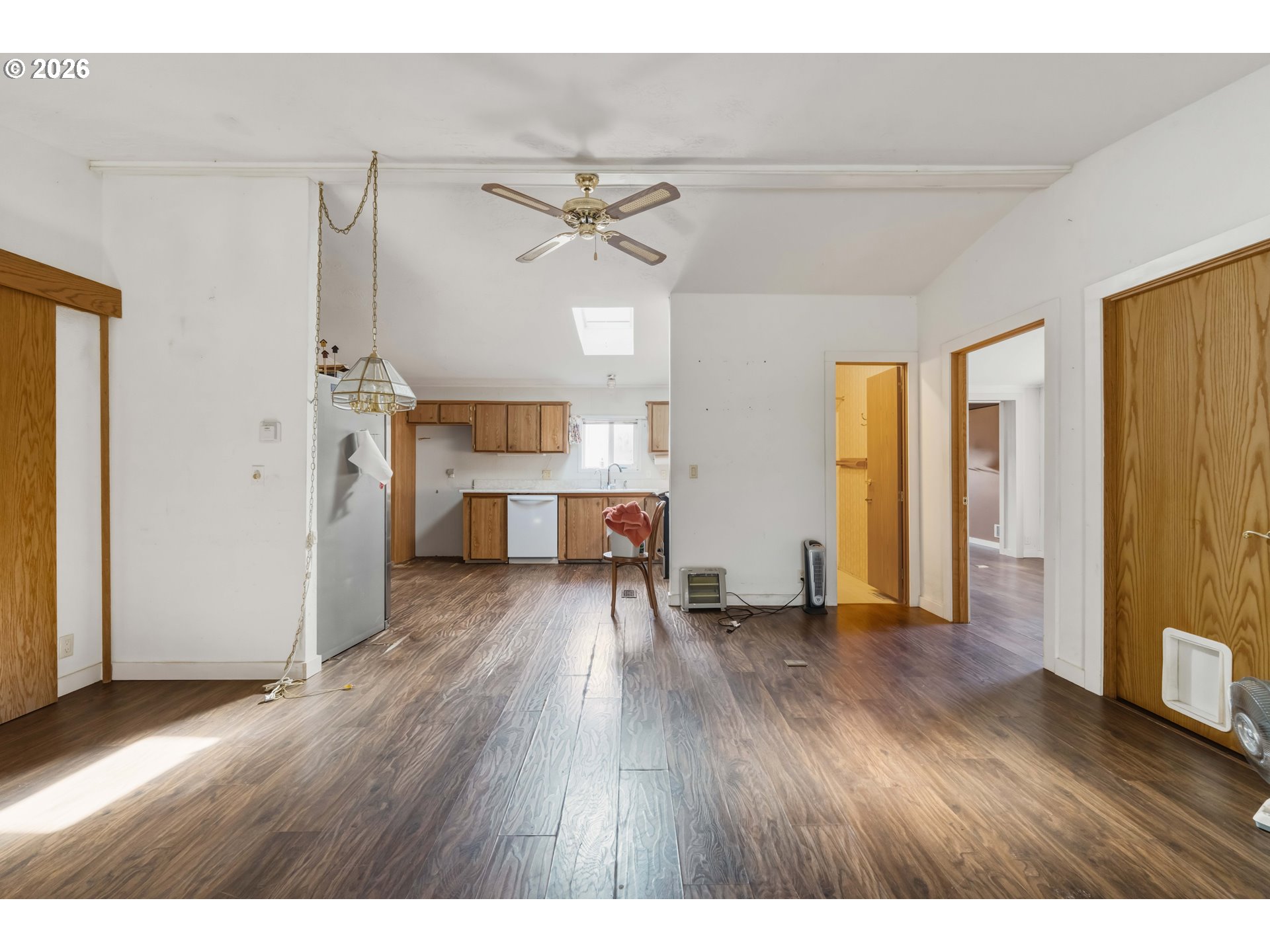 1030 June Avenue Southeast Bandon, OR 97411 - Photo 7 of 43 a view interior of a house wooden floor and windows