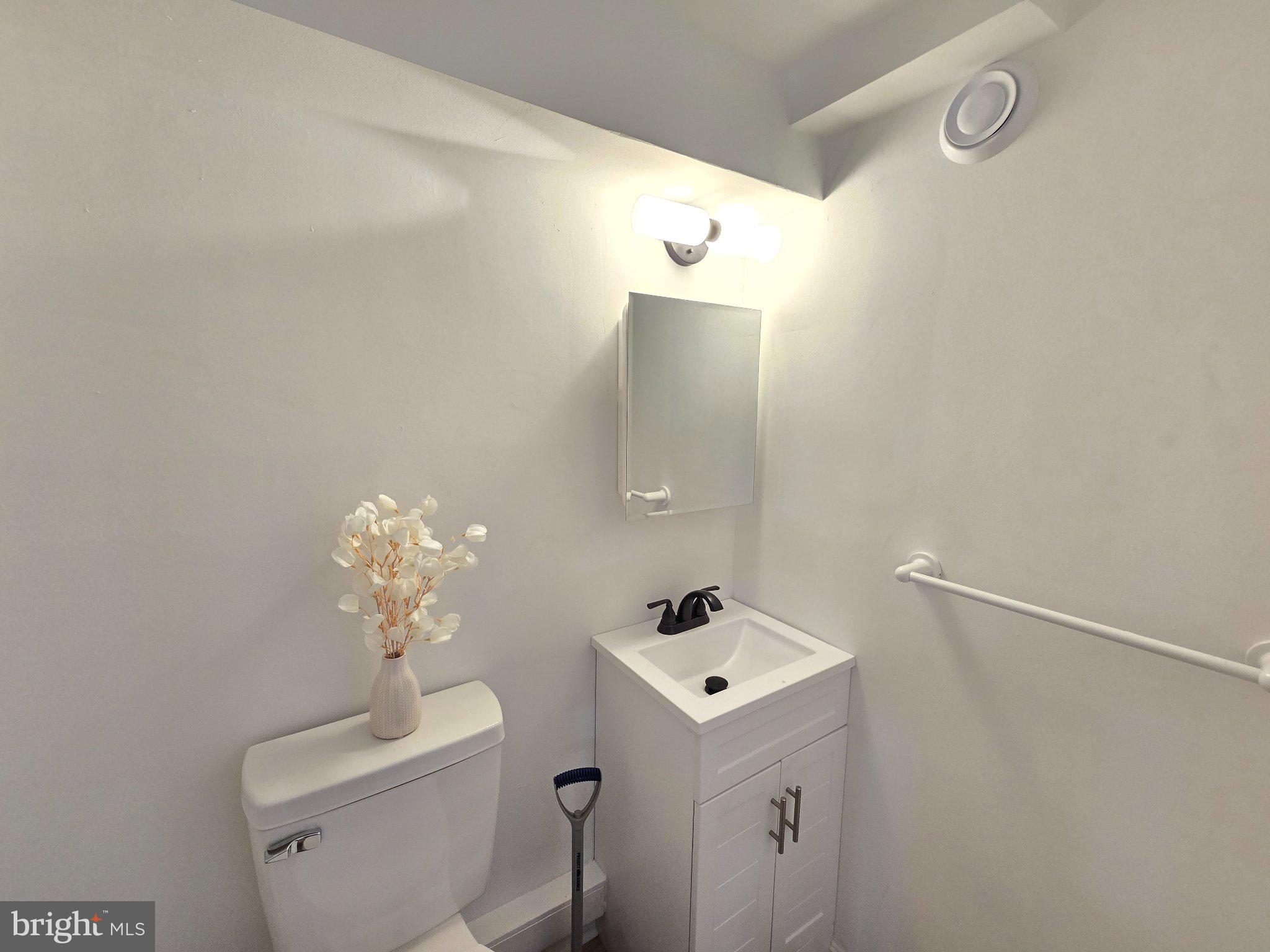 7638 Sherwood Road Philadelphia, PA 19151 - Photo 19 of 21 Charming, modern half-bath retreat.