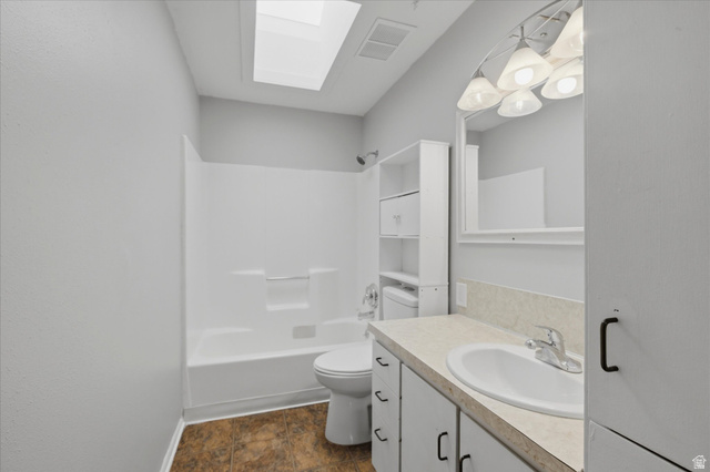 187 West 1190th Street North Logan, UT 84341 - Photo 7 of 12 Main bathroom with skylight