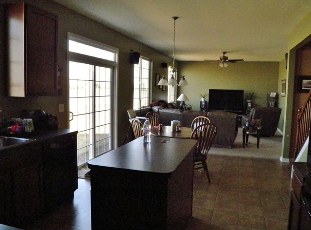 3090 Patterson Road Montgomery, IL 60538 - Photo 11 of 14 a dining room with furniture and window