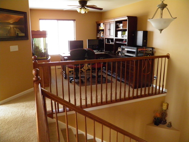 3090 Patterson Road Montgomery, IL 60538 - Photo 5 of 14 a view of dinning room with furniture and chandelier