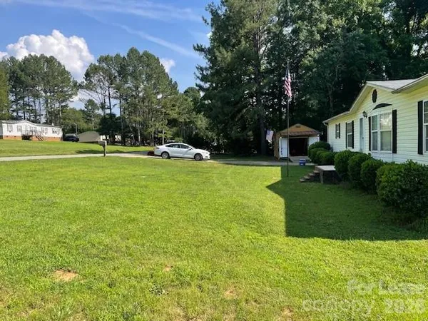 a view of a house with a swimming pool