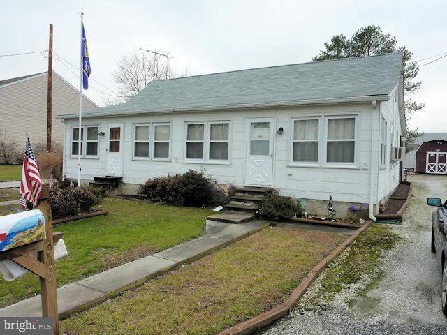 304 Miles Road Baltimore, MD 21221 - Photo 1 of 19 a front view of a house with garden
