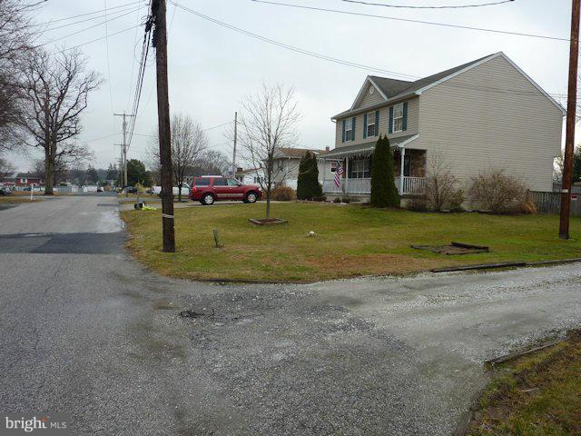 304 Miles Road Baltimore, MD 21221 - Photo 16 of 19 a view of a street with houses