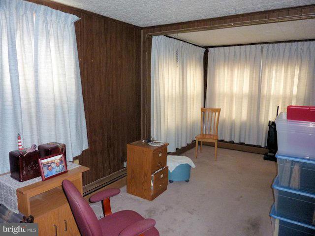 304 Miles Road Baltimore, MD 21221 - Photo 4 of 19 a room with furniture and a window