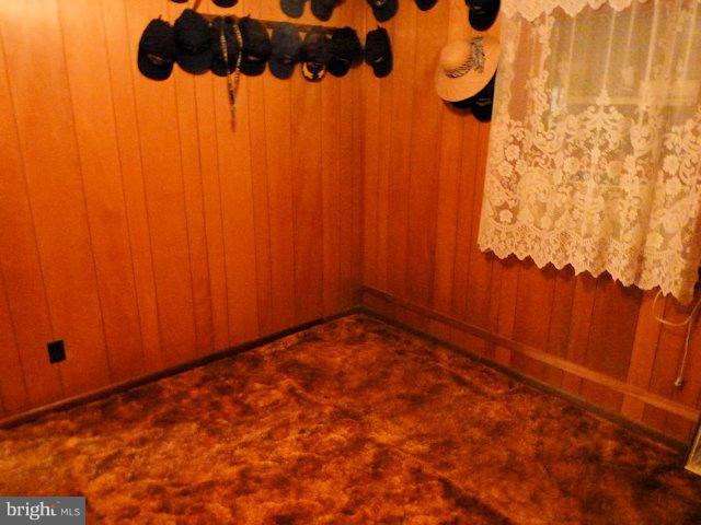 304 Miles Road Baltimore, MD 21221 - Photo 6 of 19 a view of an empty room with a window