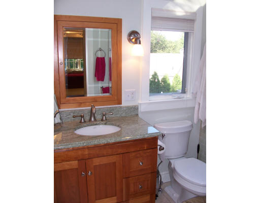 8 Squirrel Road Wellesley, MA 02481 - Photo 14 of 24 a bathroom with a granite countertop toilet sink and mirror
