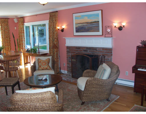 8 Squirrel Road Wellesley, MA 02481 - Photo 5 of 24 a living room with furniture and a fireplace