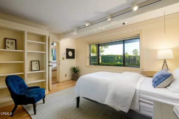 a kitchen with cabinets appliances and a sink