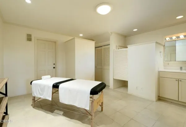 a view of a swimming pool with a garden