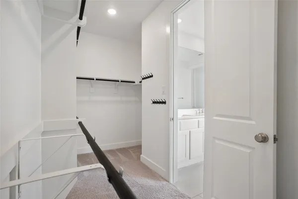 a bathroom with a shower and a sink