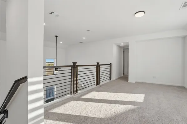 a view of a room with stairs and a couch