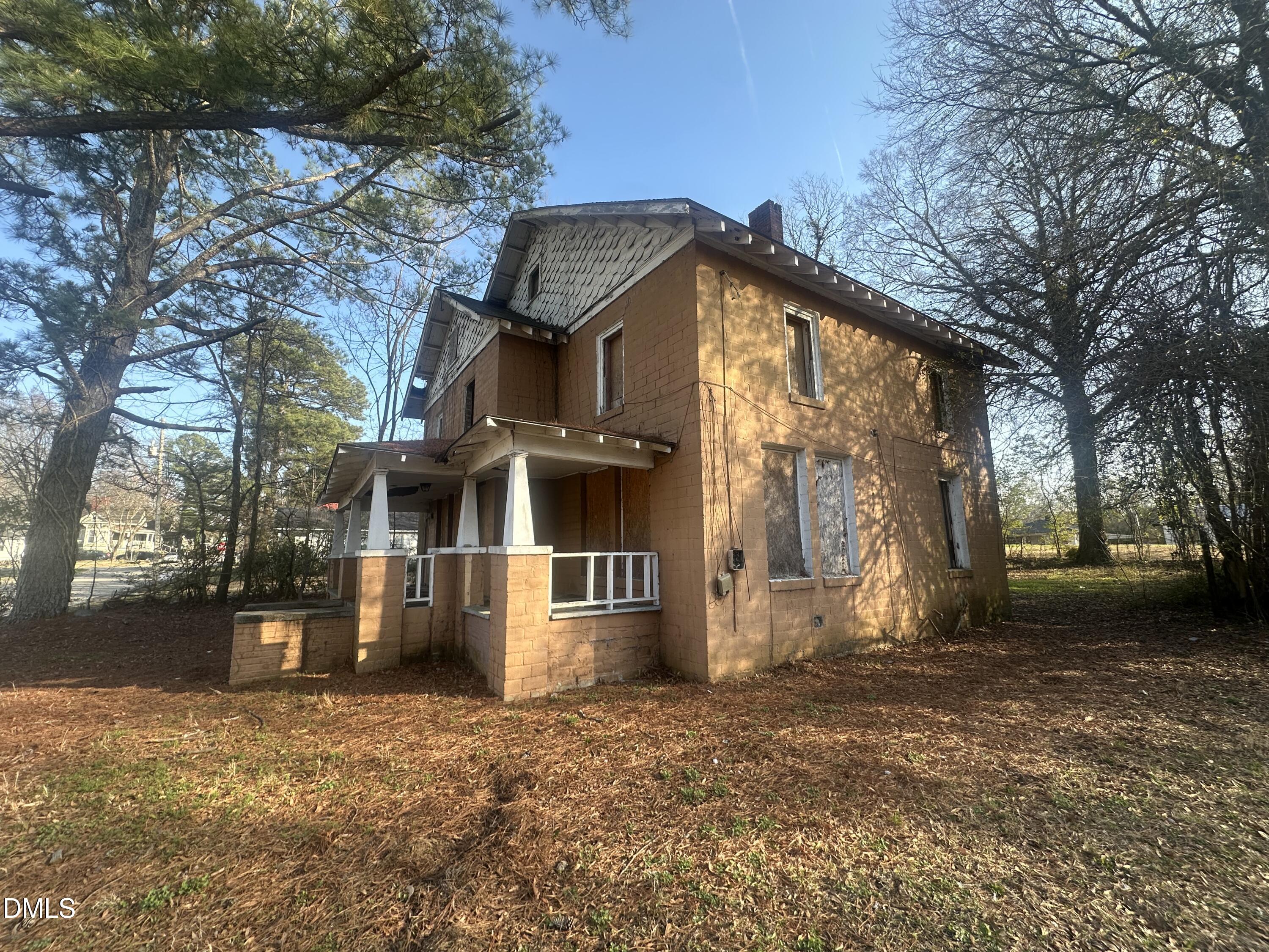 804 Vance Street East Wilson, NC 27893 - Photo 2 of 4 a view of a house with a yard