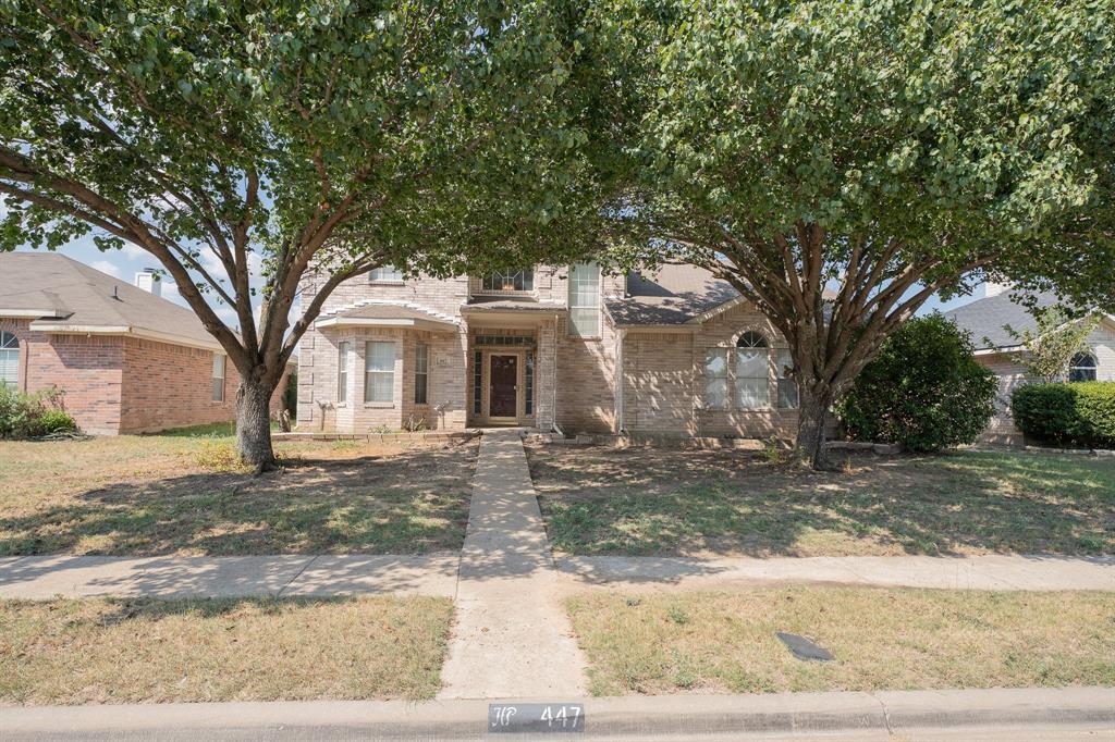 447 Maple Grove Drive Cedar Hill, TX 75104 - Photo 1 of 15 a view of a yard with a tree