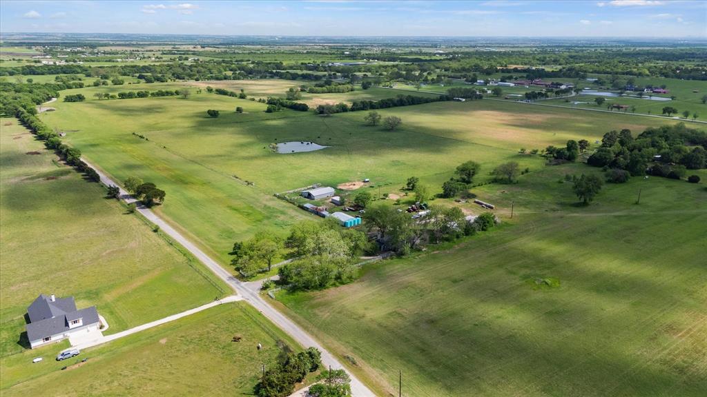 11742 Dane Road Pilot Point, TX 76258 - Photo 14 of 37 a view of a lake with a city