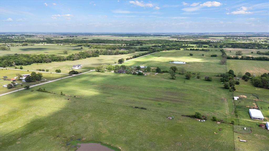 11742 Dane Road Pilot Point, TX 76258 - Photo 17 of 37 a view of a lake with a houses