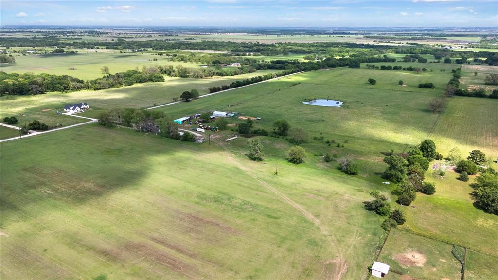 11742 Dane Road Pilot Point, TX 76258 - Photo 18 of 37 a view of a lake with a city