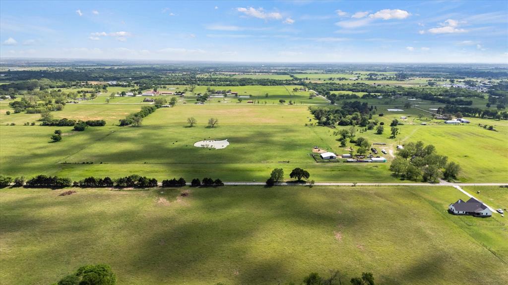 11742 Dane Road Pilot Point, TX 76258 - Photo 4 of 37 a view of a lake with a city