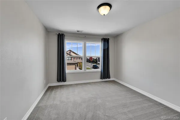 a view of a livingroom with a staircase