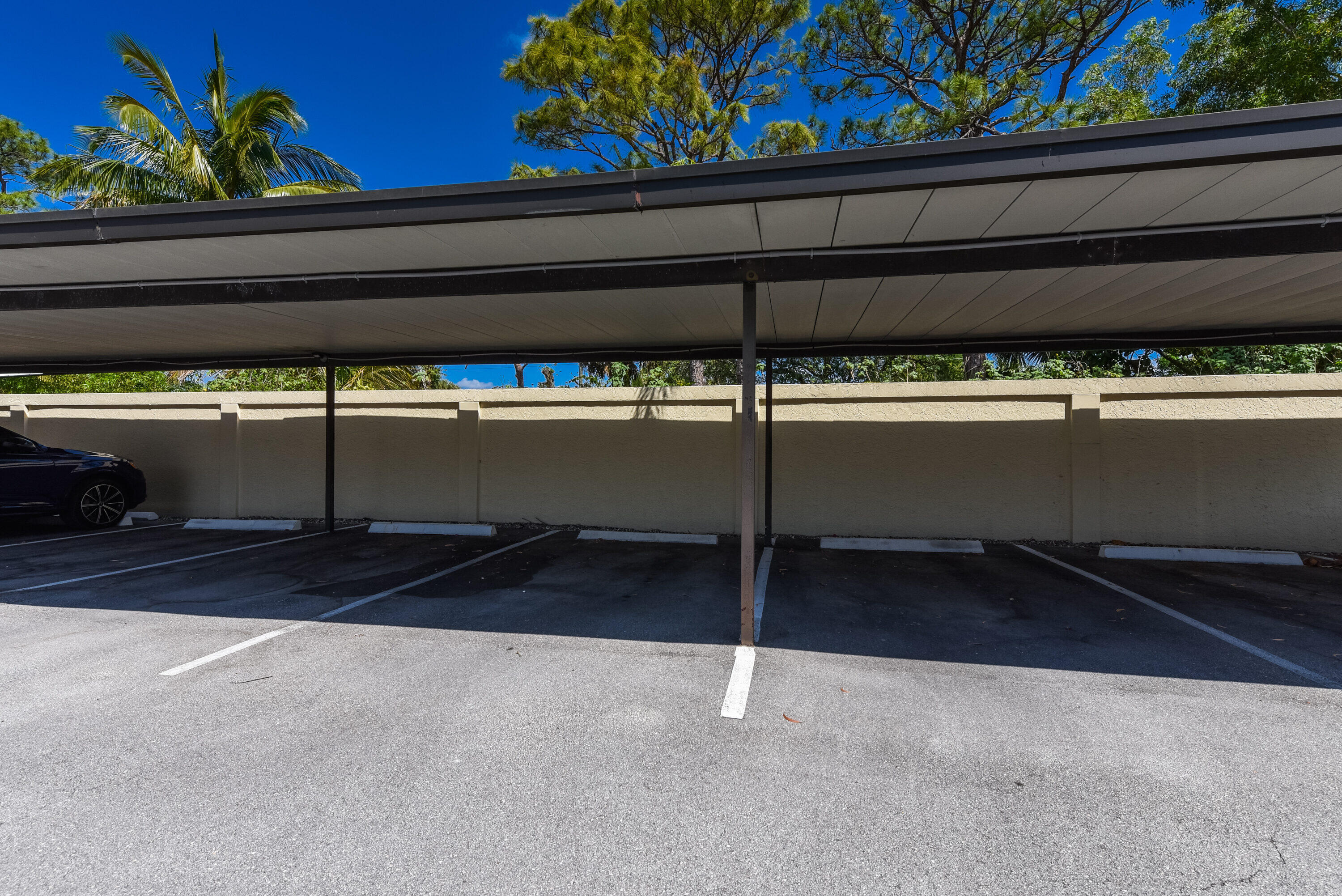 1871 Southwest Palm City Road, Unit G201 Stuart, FL 34994 - Photo 25 of 25 Covered parking