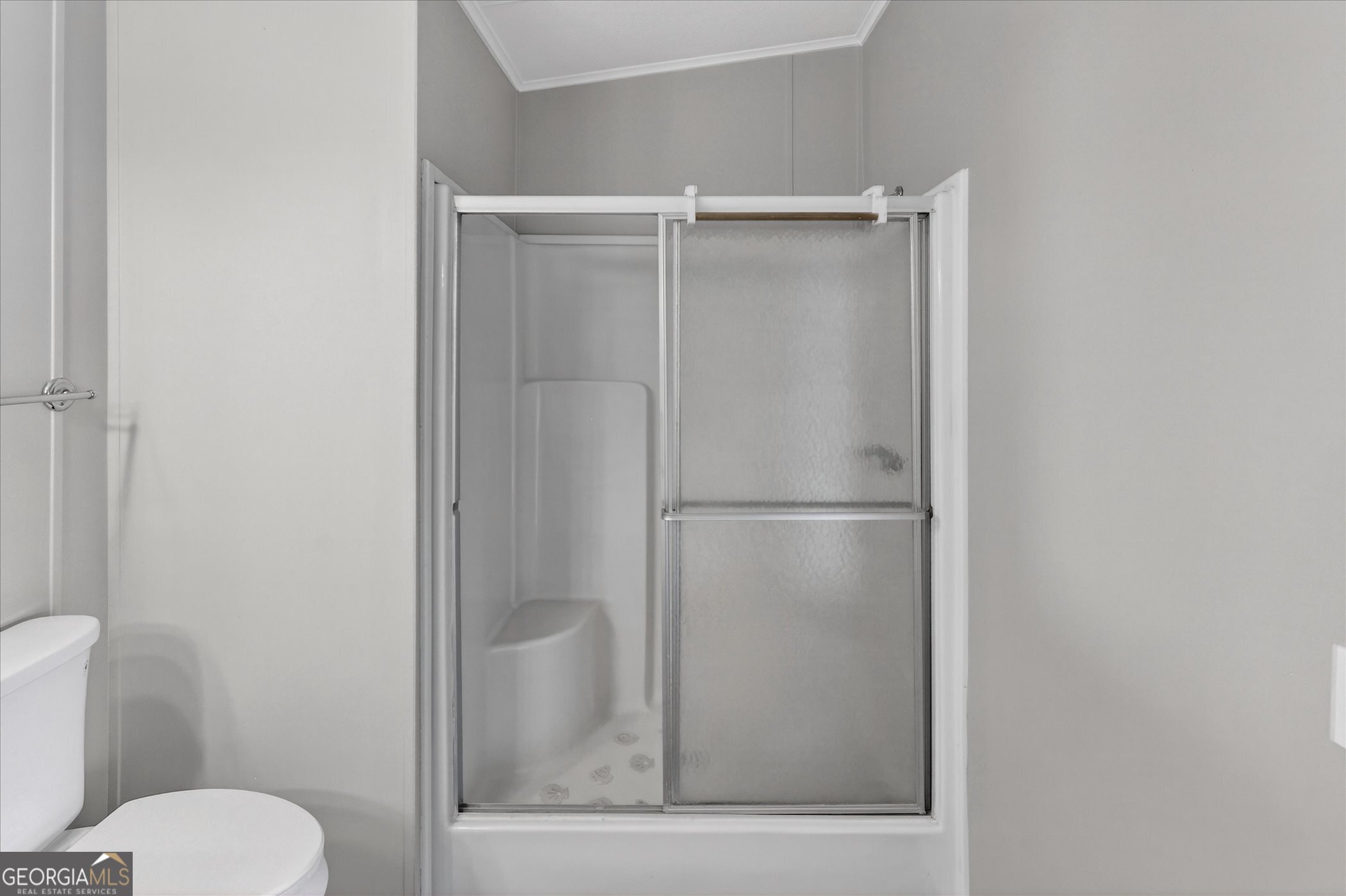 13541 Pine Burr Road Metter, GA 30439 - Photo 22 of 44 a bathroom with a shower