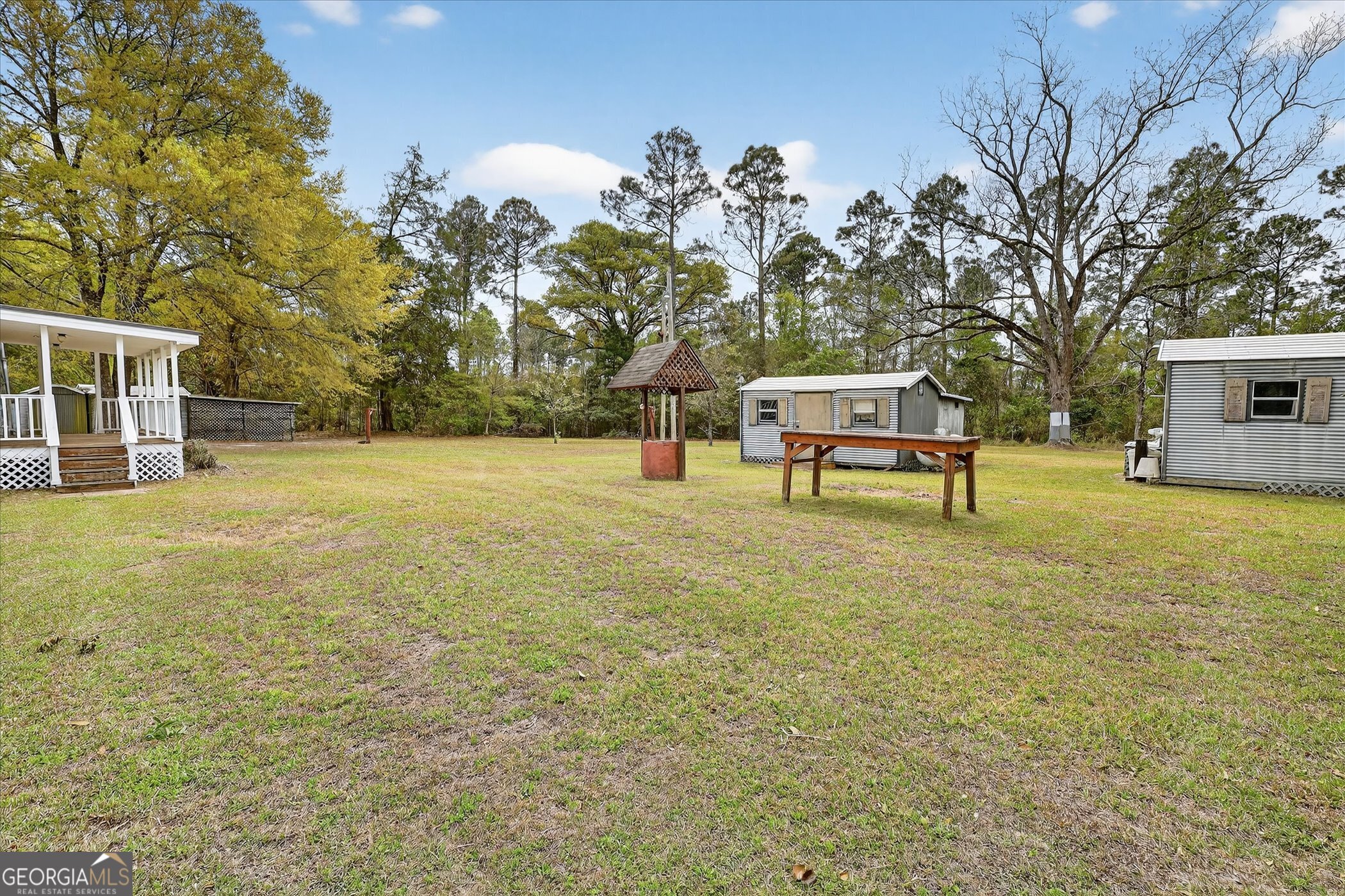 13541 Pine Burr Road Metter, GA 30439 - Photo 34 of 44 a garden with trees