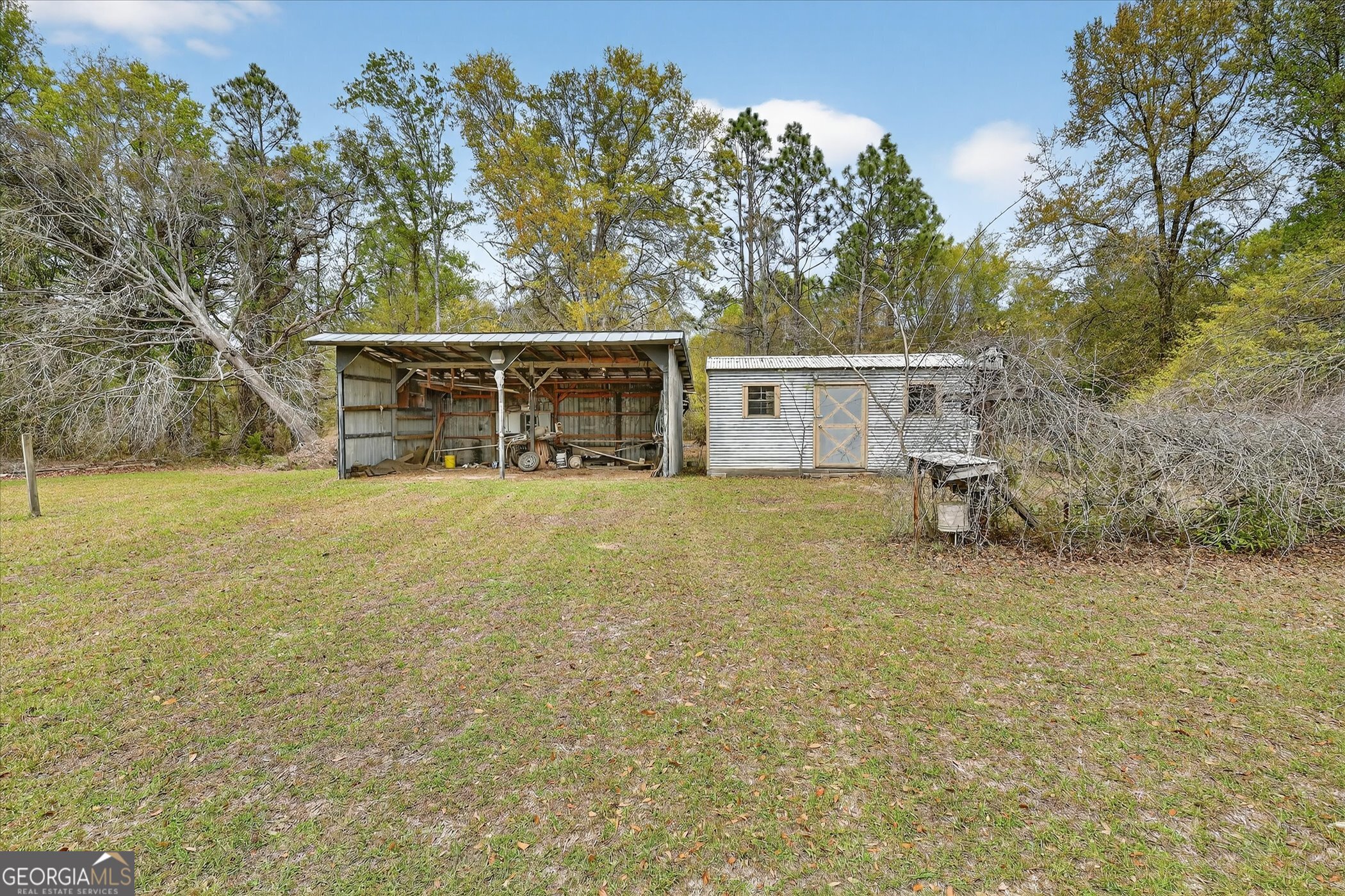 13541 Pine Burr Road Metter, GA 30439 - Photo 35 of 44 a view of a house with a outdoor space
