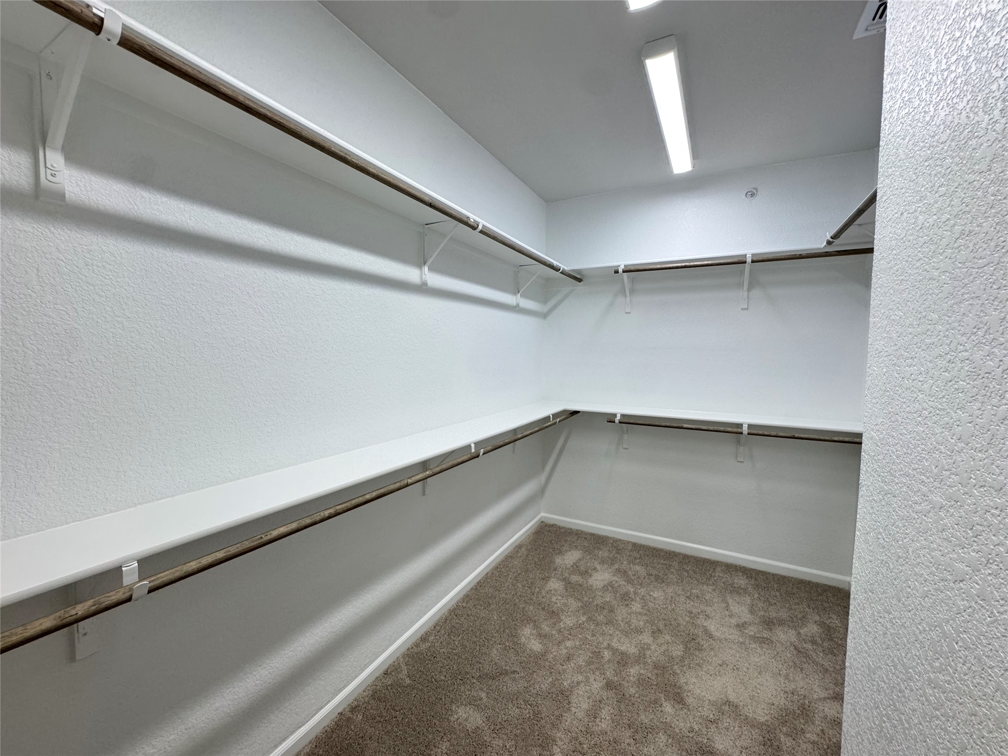 3000 Chisholm Trail Road, Unit 3 Round Rock, TX 78681 - Photo 19 of 28 a view of a room with racks on the wall