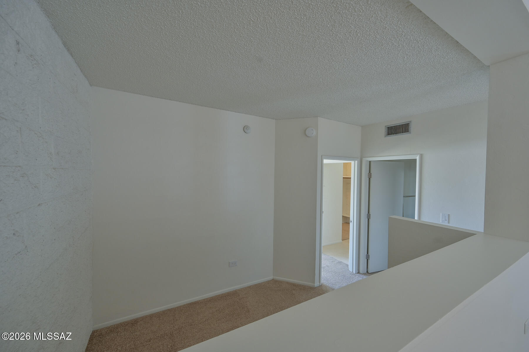 7777 East Golf Links Road, Unit 2308 Tucson, AZ 85730 - Photo 14 of 37 a view of hallway with window