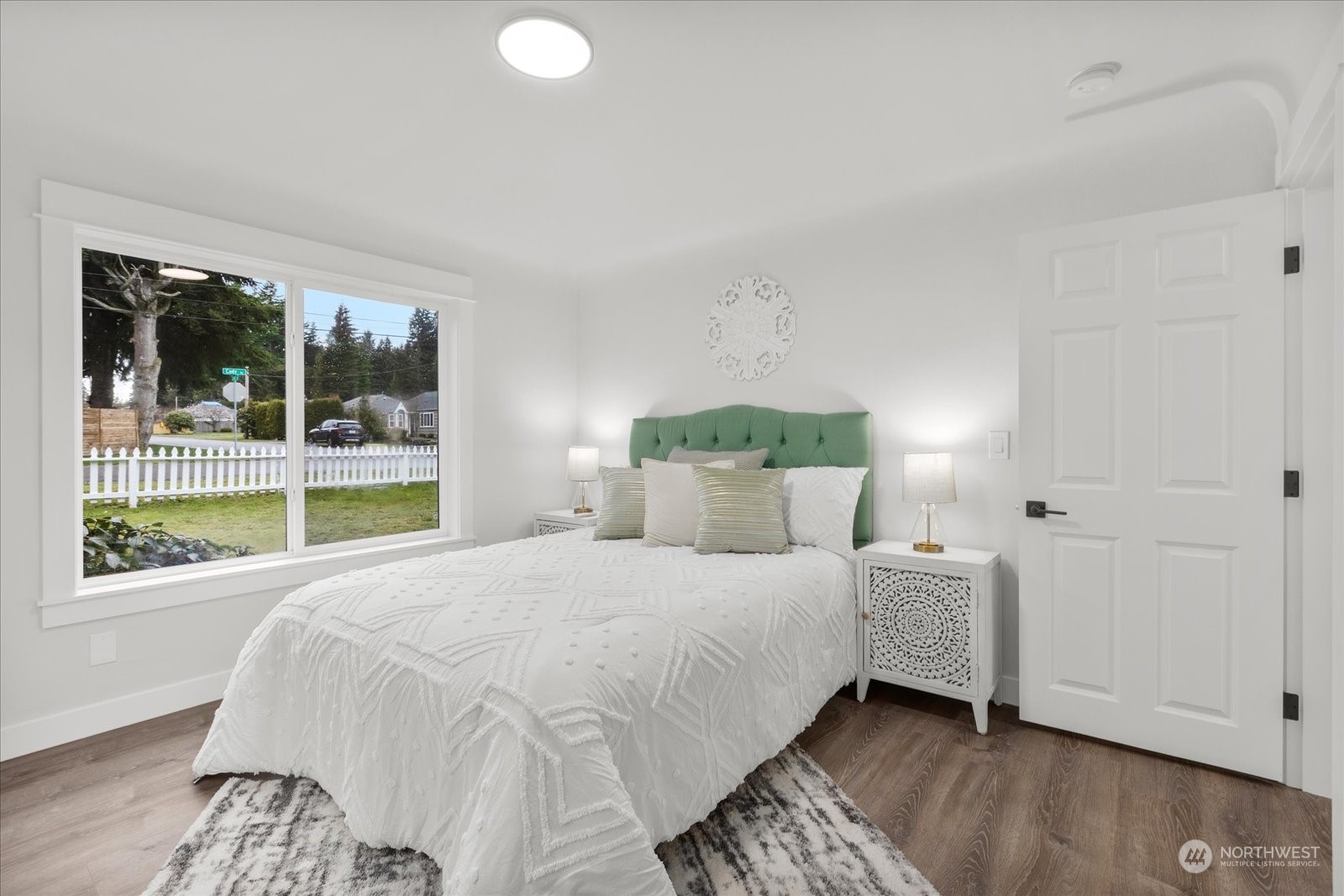 6919 Cady Road Everett, WA 98203 - Photo 19 of 39 a bedroom with a bed and a large window